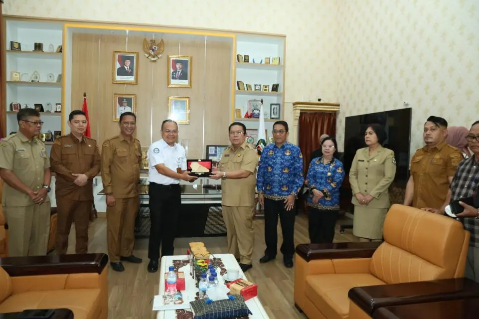 Wesly Silalahi Menandatangani Nota Kesepakatan dengan Kepala BPJS